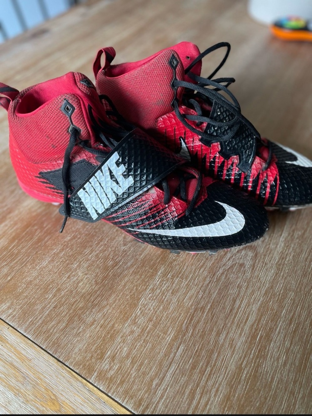 Nike Black and Red High-Top football Cleats with White Swoosh